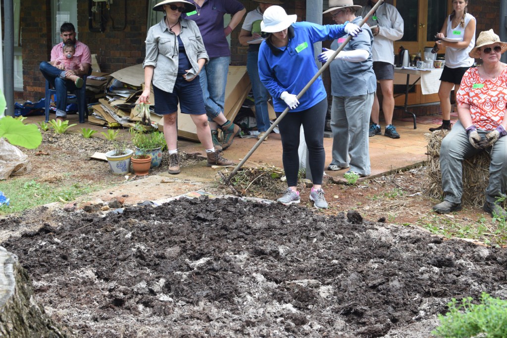 Accommodation Maleny Mushroom compost being layed in organic garden